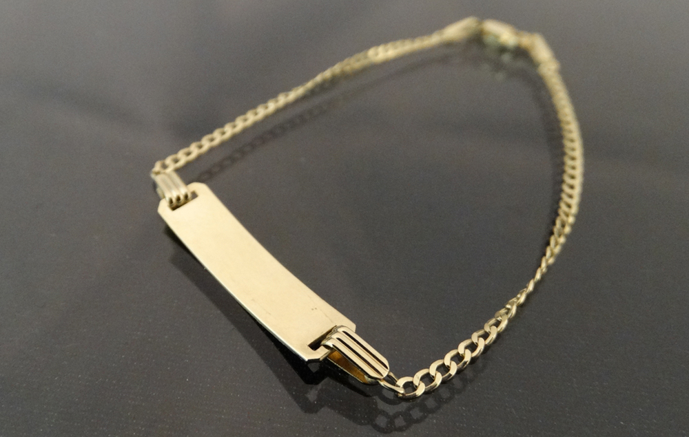 Esclava de bebé con placa oro