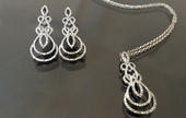 Aretes y dije oro blanco